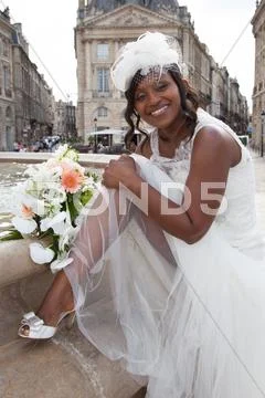 Beautiful african american bride portrait with veil over her face Stock Photos