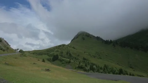 Beautiful Alpine landscape with clouds and mountains. Steadicam zoom Stock Footage 160760881