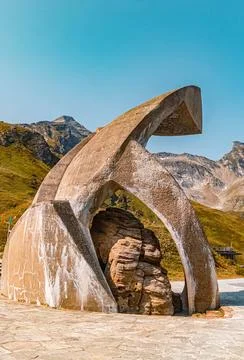 Beautiful alpine summer view with a huge stone memorial at the famous Kapr... Stock Photos