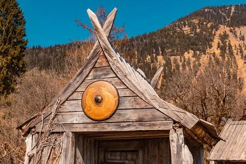 Beautiful alpine winter view with elements of a viking village at the famo... Stock Photos