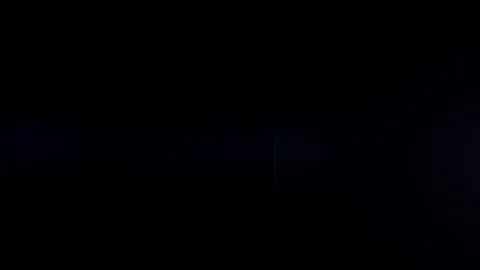 Beautiful anamorphic light on a black background Stock Footage 87921147