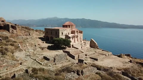 Beautiful ancient monastery on a hillside overlooking the seav 库存影片 301735639
