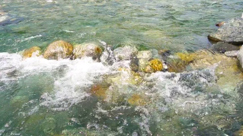 Beautiful and clean river flows over rocks Stock Footage 112103907