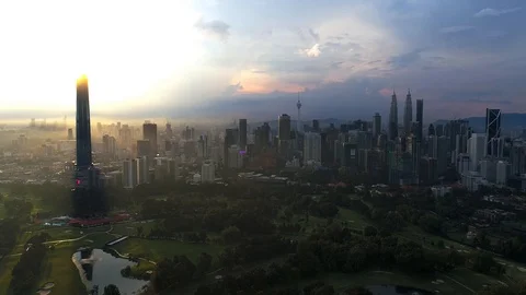 Beautiful and dramatic sunset aerial view of the Kuala Lumpur city Stock Footage 102510953