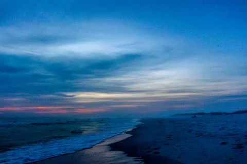 Beautiful and dramatic sunset evening on a white sand beach 11192-26 Foto stock