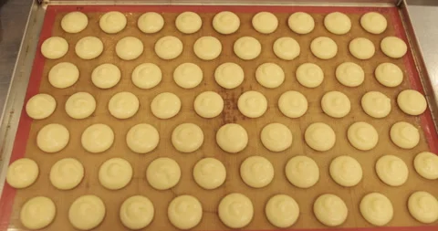 Beautiful and even rows of squeezed cream for cooking in the oven. Stock Footage 253850118