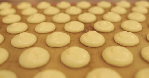 Beautiful and even rows of squeezed cream for cooking in the oven. Stock Footage 253850379