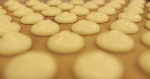 Beautiful and even rows of squeezed cream for cooking in the oven. Stock Footage 253850578