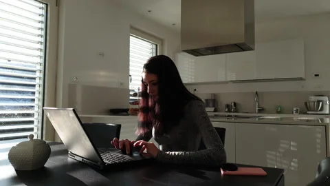 Beautiful and serious about the computer. Zoom in. Video stock 238811488