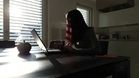 Beautiful and serious about the computer. Zoom in. Stock Footage 238812943