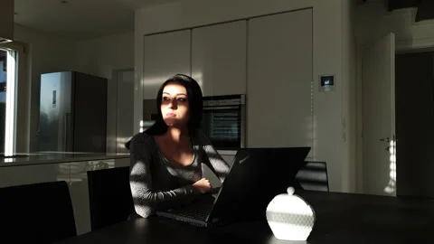 Beautiful and serious about the computer. Zoom in. Stock Footage 238813196