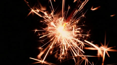 Beautiful and simple burning of a sparkler close-up Stock Footage 170136330