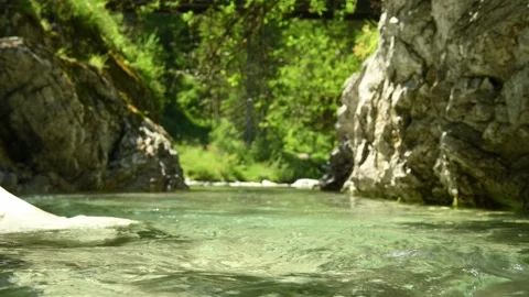 Beautiful and wild small stream in the mountains with water flowing in a pond Video stock 211489620