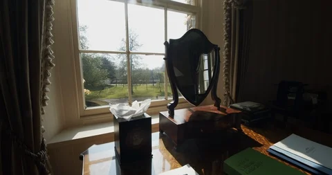 Beautiful Antique Mirror In Front Of a Window In A Luxurious English Mansion Stock Footage 107558730