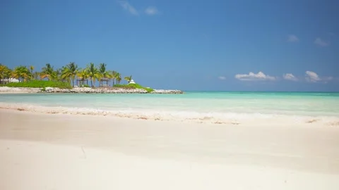 Beautiful Api beach with white sand and stone embankment in the background Stock Footage 272228529