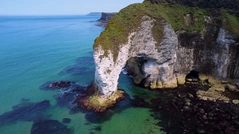 Beautiful arch rocks and waves northern ireland drone footage 2.7k Video stock 209185925