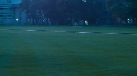 A Beautiful Architectural Tower Overlooks A Large Green Grassy Knoll. Stock Footage 45703879
