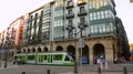Beautiful architecture and modern public transport in street of Bilbao, Spain HD Footage