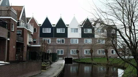 Beautiful architecture Volendam. Typical small Dutch houses facades in Volendam Stock Footage 110779861