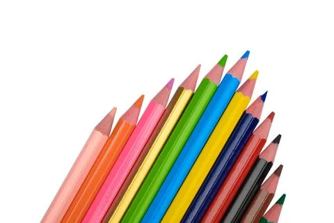 Beautiful arrow pattern made with some different wood pencil crayons on white Stock Photos