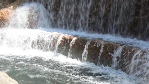 A beautiful artificial waterfall in entertaining park Vídeos de archivo 93678705