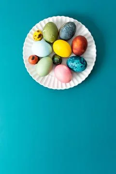 A beautiful assortment of Easter eggs in various colors and patterns is dis.. Stock Photos