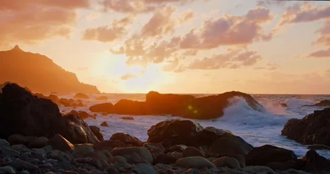 Beautiful Atlantic ocean waves with foam and stone beach Stock Footage 304112448
