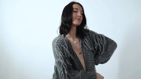 Beautiful Authentic Fashion Model Posing and Wearing Elegance Sweater. Video stock 148940969