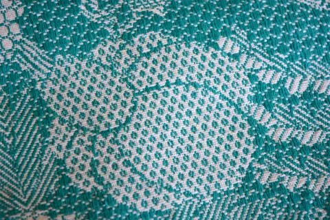 Beautiful authentic Ukrainian pattern on fabric of flowers, leaves, petals. 库存照片