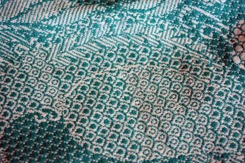 Beautiful authentic Ukrainian pattern on fabric of flowers, leaves, petals. Stockfoto's