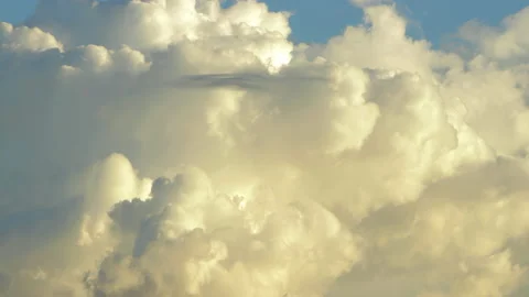 Beautiful background of blue sky, white fluffy clouds smoothly and quickly at Stock Footage 161127531