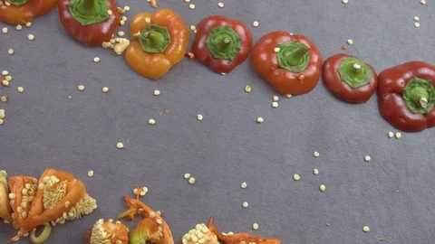 Beautiful background of chopped bell pepper and seeds Vidéo 116504837
