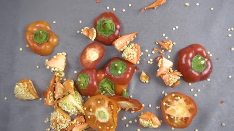 Beautiful background of chopped bell pepper and seeds Stock Footage 116505132