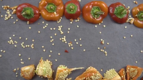Beautiful background of chopped bell pepper and seeds Stock Footage 116505165