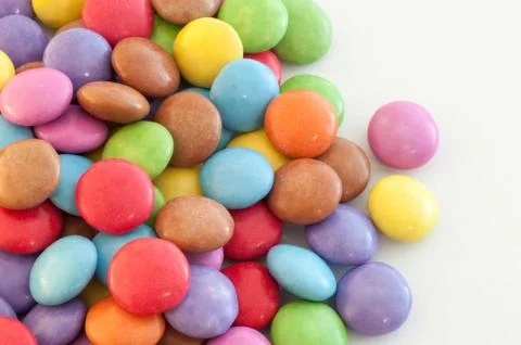 Beautiful background of circular colored and various candy or pills Stock Photos