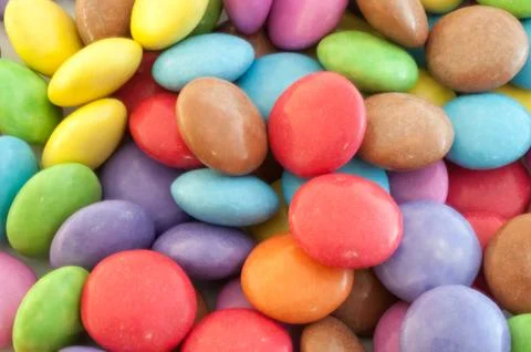 Beautiful background of circular colored and various candy or pills Foto stock