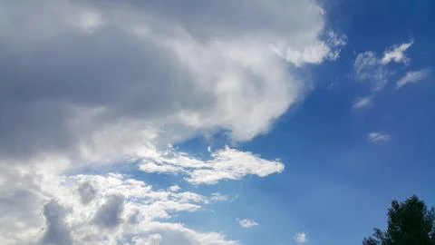 Beautiful background of clouds and trees Stock Photos