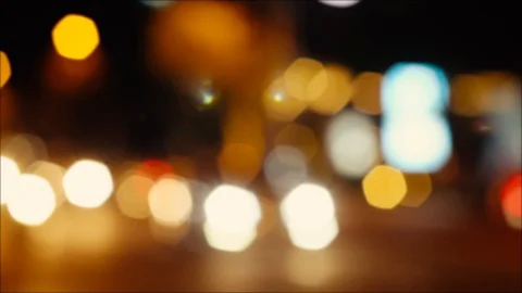 Beautiful background on dark, defocused lights of car traffic. 動画素材 106386150