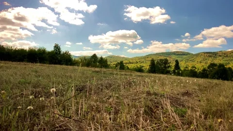 Beautiful Background Fast Moving Clouds Mountain. Field And Old Mountain. Stock Footage 151599293