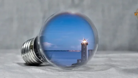 Beautiful Background LightBulb And Inside Globe Flying With The Sea of Backgound Stock Footage 109147103