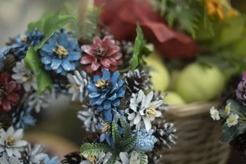 Beautiful background of natural objects. Wreath of spruce cones. Stock Photos