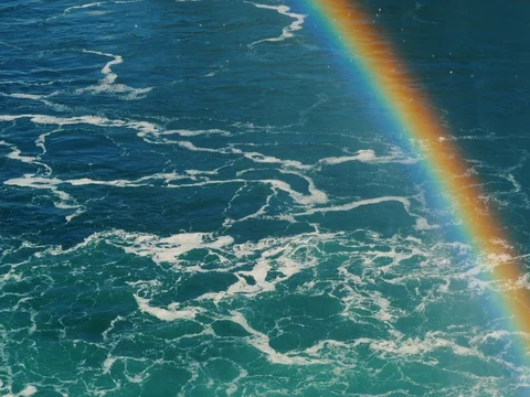 Beautiful background with a river and a rainbow in the corner. The waters of the Stock Footage 82304330