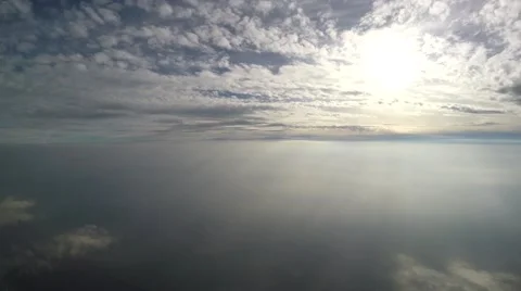 Beautiful background - sunset sky, bright sun shines through clouds Stock Footage 68995974