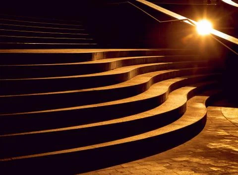 Beautiful background. Texture. Sunset and stairs. Yello lights Stock Photos