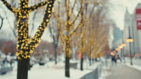 A beautiful background of trees dressed in yellow light, as well as street lamps Video stock 322679690