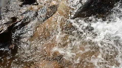 Beautiful backlight waterfall shot from inside a cave Stock Footage 8622762