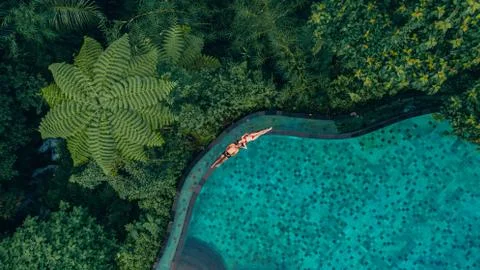 Beautiful Bali Pool Side Couple Drone Photography Stock Photos