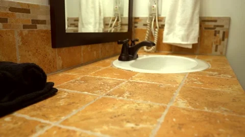 Beautiful bathroom interior design of vanity cabinet, traditional tile Stock Footage 143370666