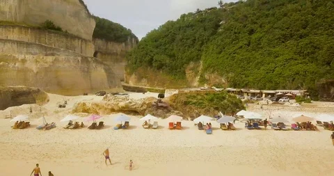Beautiful beach aerial view at 4 to video, tourists relax on the beach Stock Footage 103986579