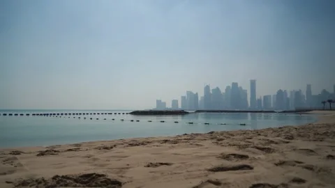 Beautiful beach in Doha, Qatar. View to the skyline of downtown Stock-Footage 150957360